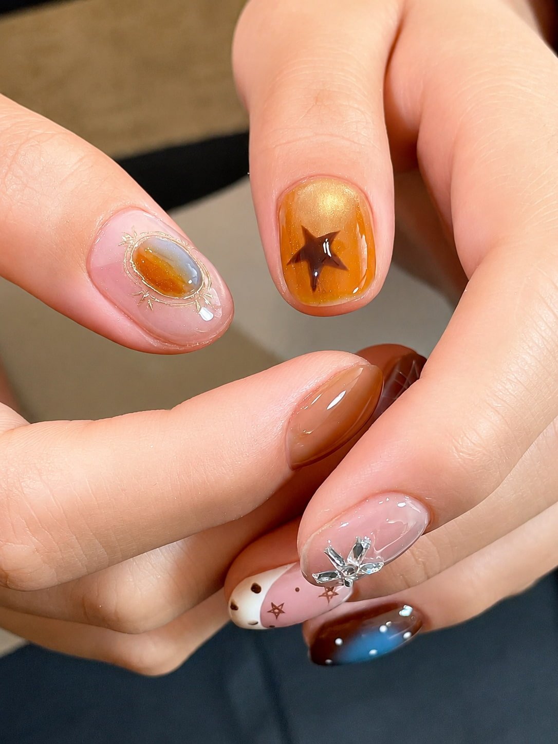 Amber Star and Blush Pink Fall Nail Design with Crystal Charm