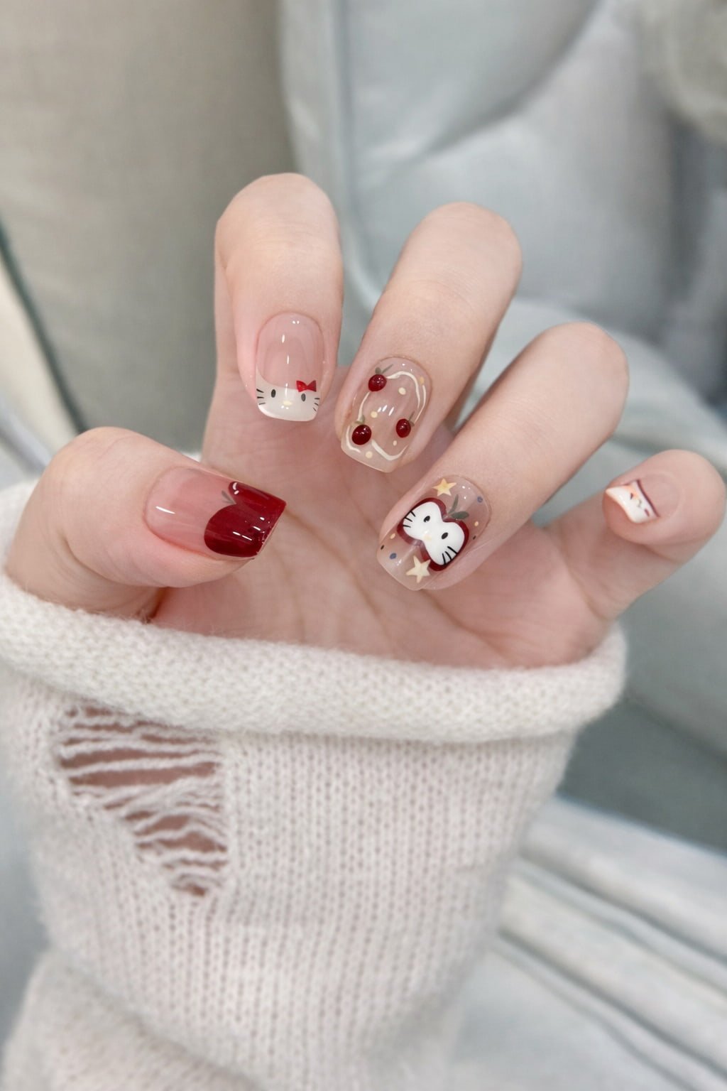 Apple Inspired Hello Kitty Nail