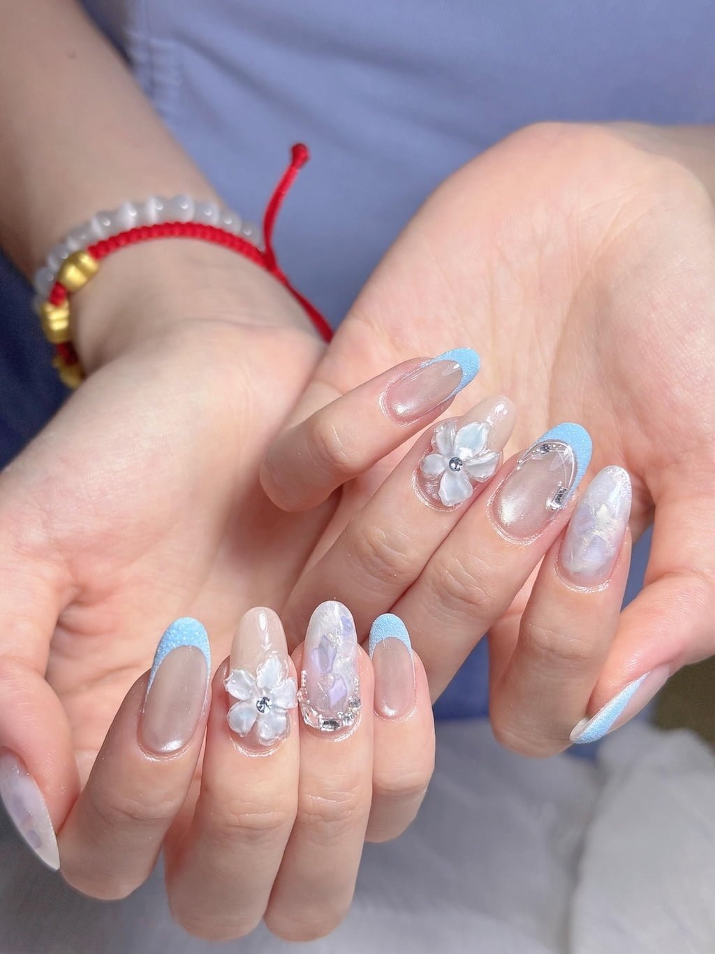 Baby Blue French Nails with 3D Flowers and Pearl Chrome Details