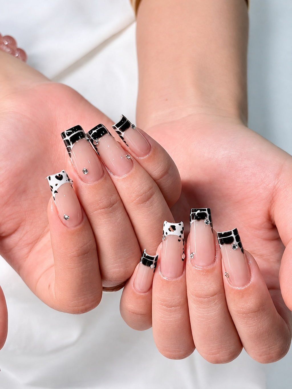 Black and White Cow Print French Tip Preppy Nails