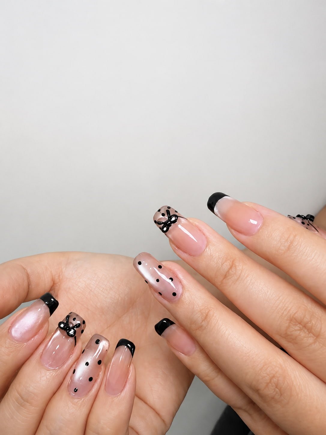 Black French Nails with Polka Dots and 3D Bow Details