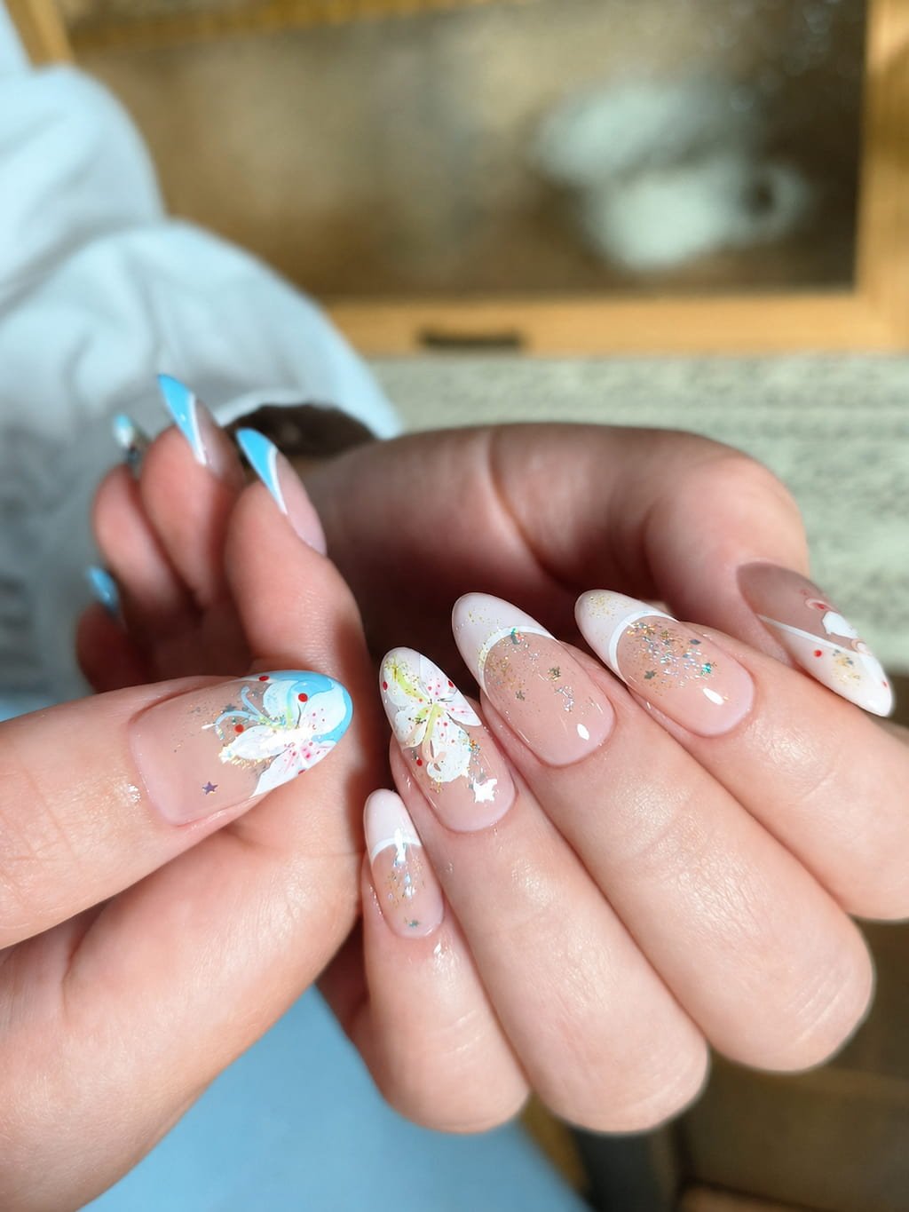 Blue French Tip Summer Nail Art with Floral Details