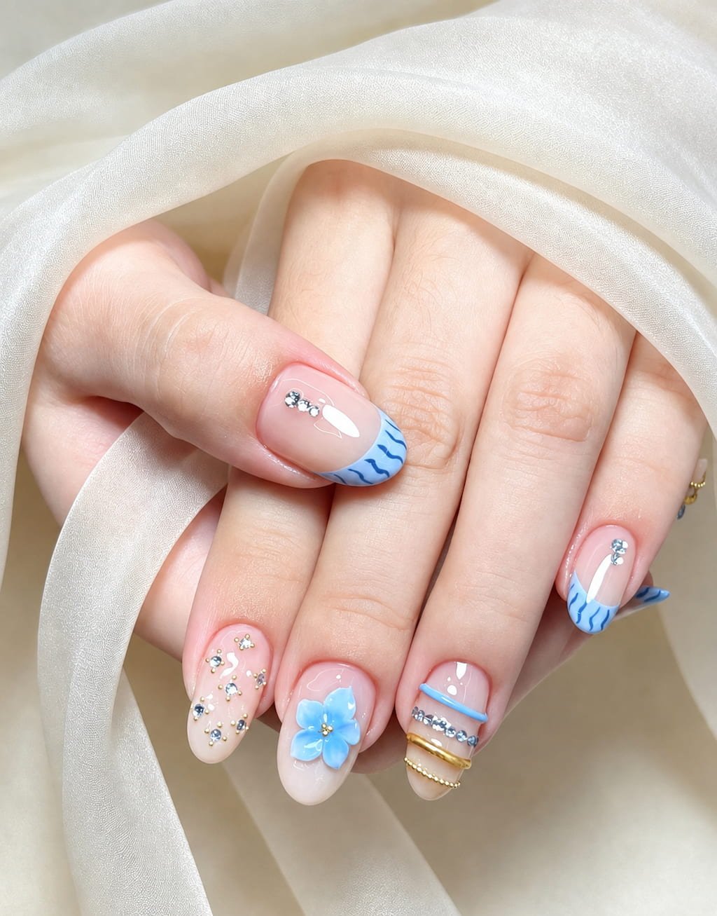 Blue Hibiscus Waves and Crystal French Tip August Nails