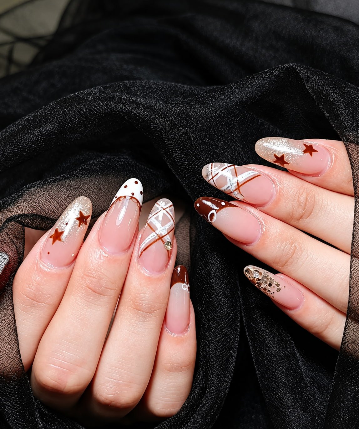 Brown French Nails with Star Prints, Plaid Lines, and Glitter Accents
