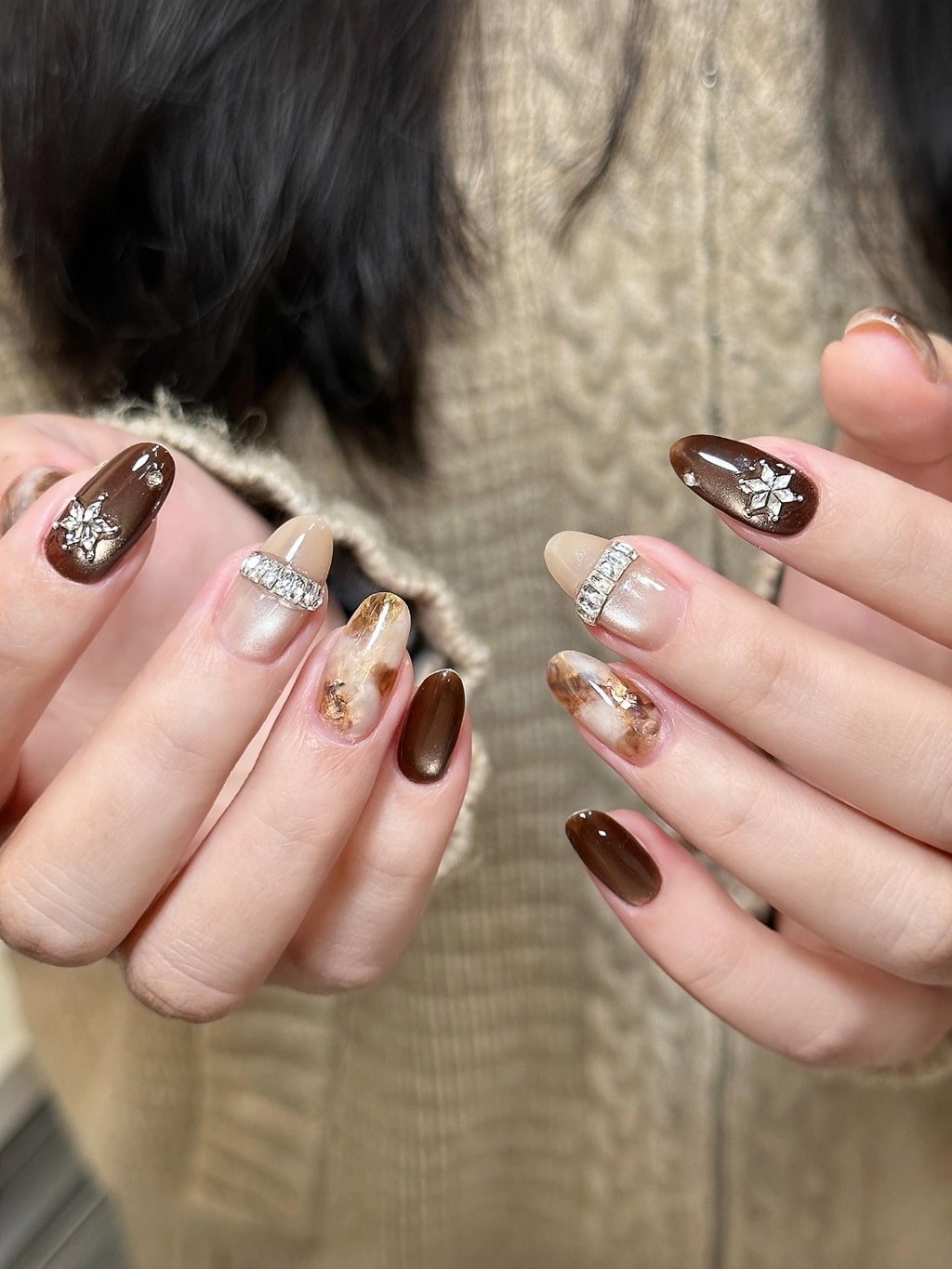 Brown Marble and Crystal Fall Nail Design with Glossy Almond Shape