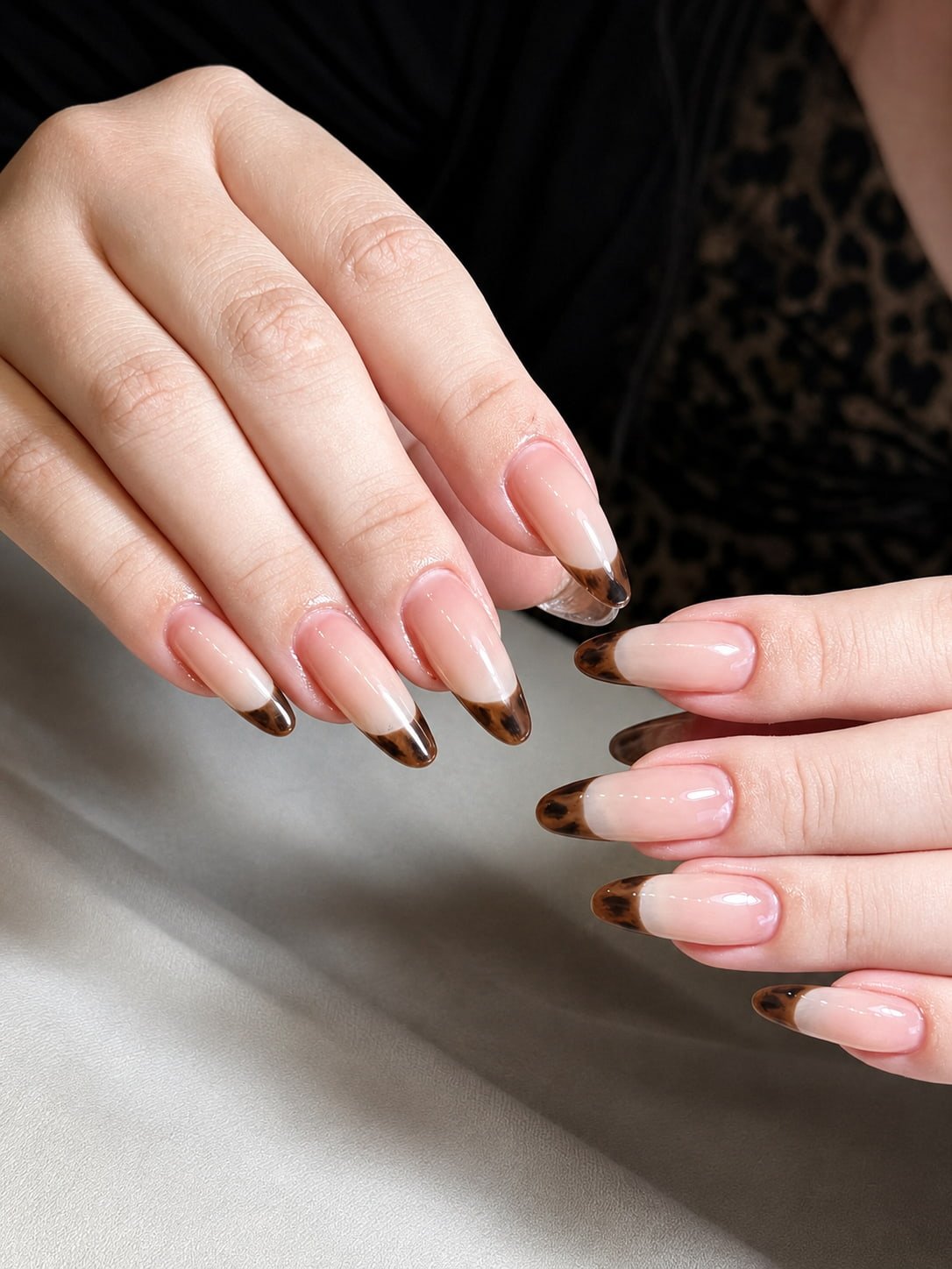 Brown Tortoiseshell French Nails on a Sheer Nude Base