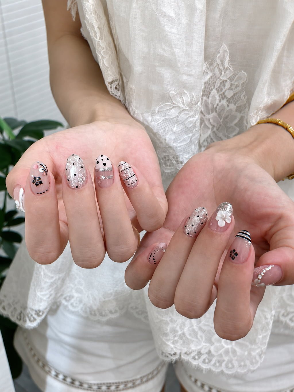Chic Monochrome Preppy Nails with Lace and Bow Art