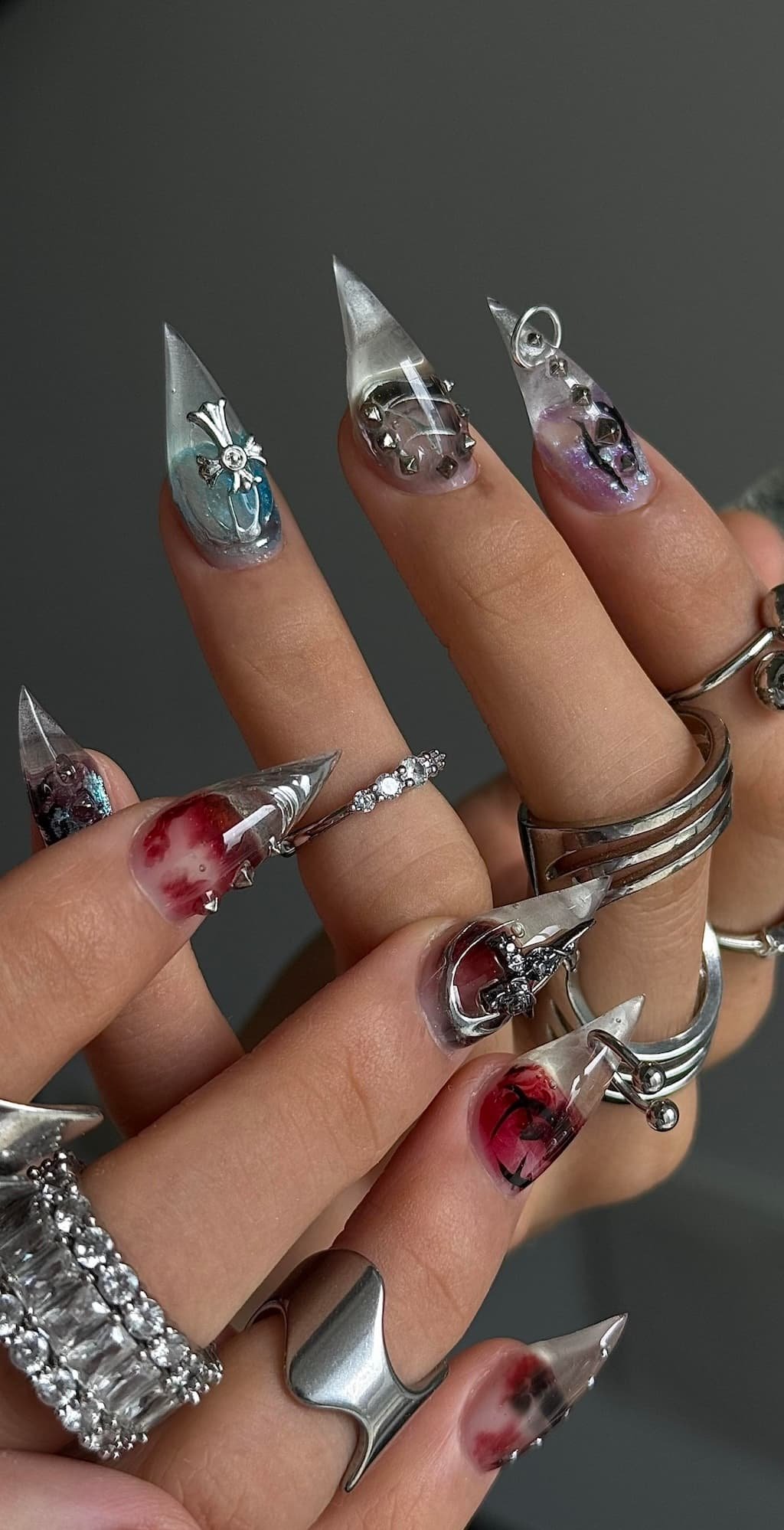 Chrome Cat Claw Nails with Metallic Studs and Red Details