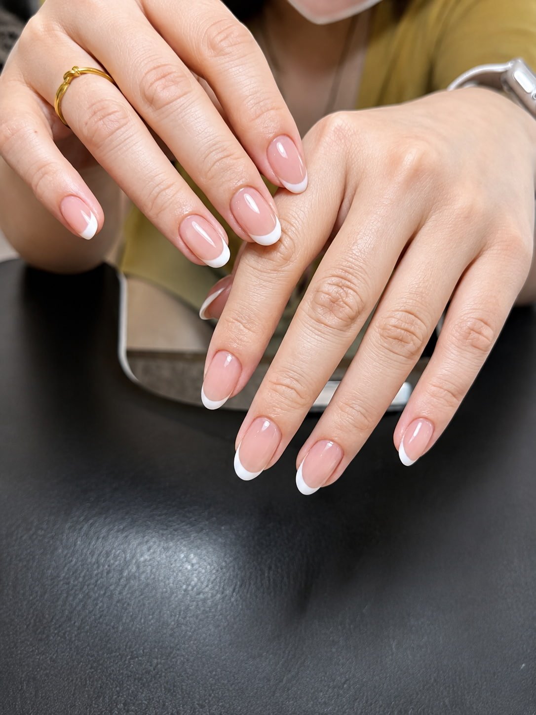 Classic White French Nails with a Glossy Sheer Pink Base