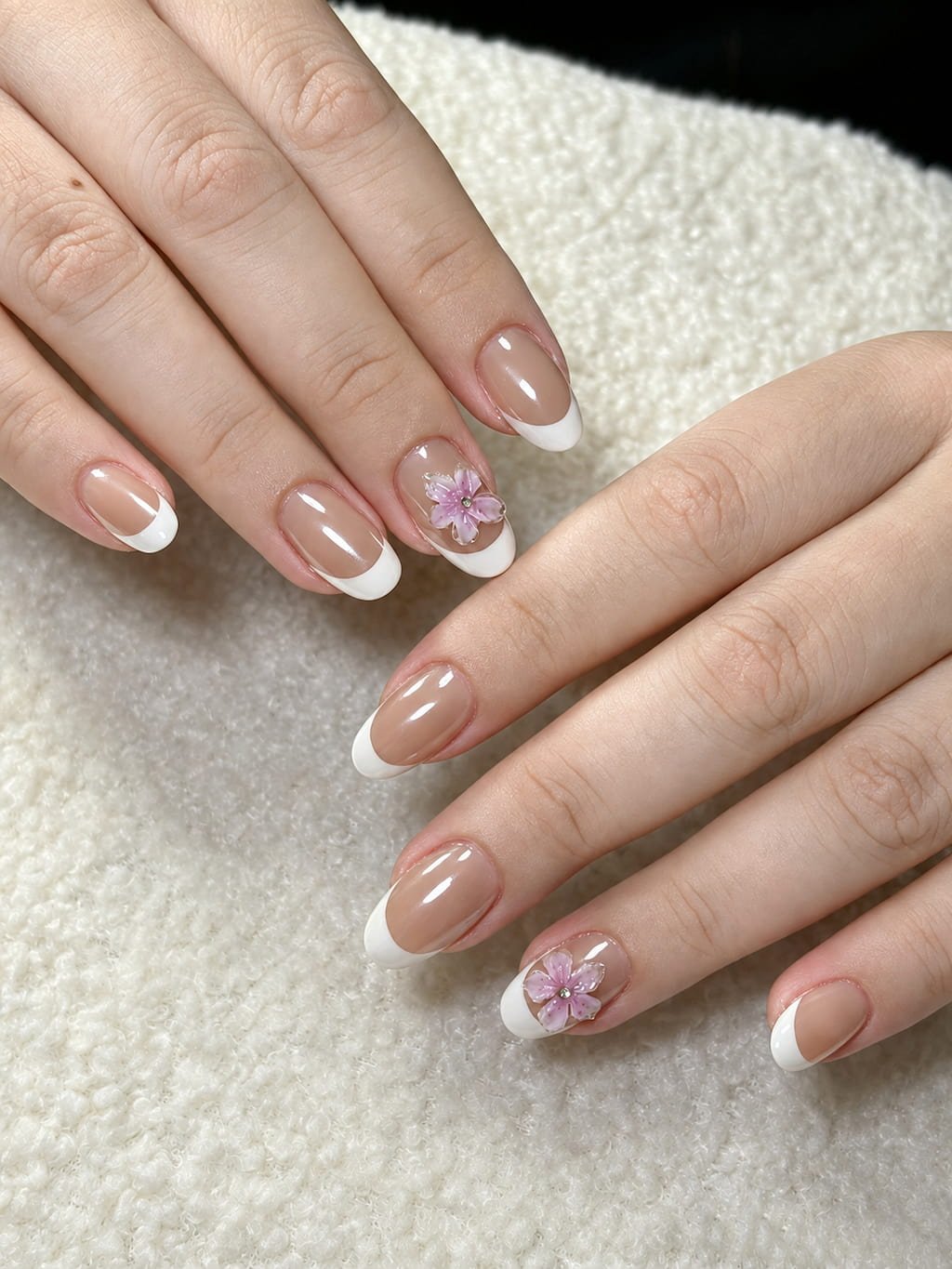 Classic White French Summer Nail Design with Pink Flowers