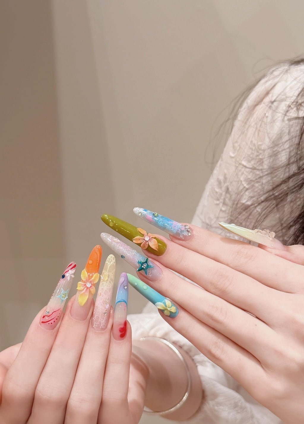 Colorful 3D Floral Summer Nail Design with Mixed Pastel Art