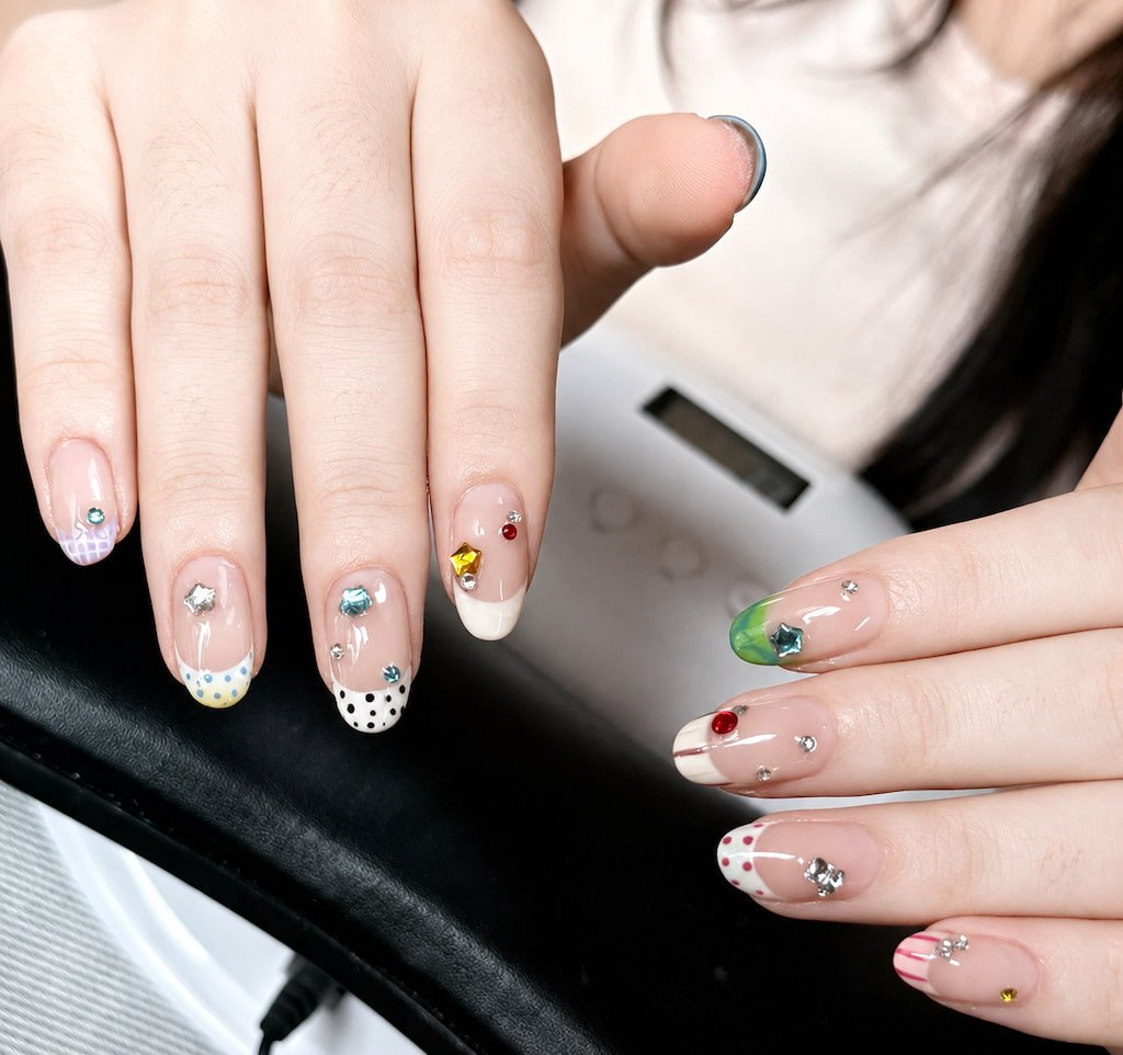 Colorful French Tip Preppy Nails with Gemstone Accents