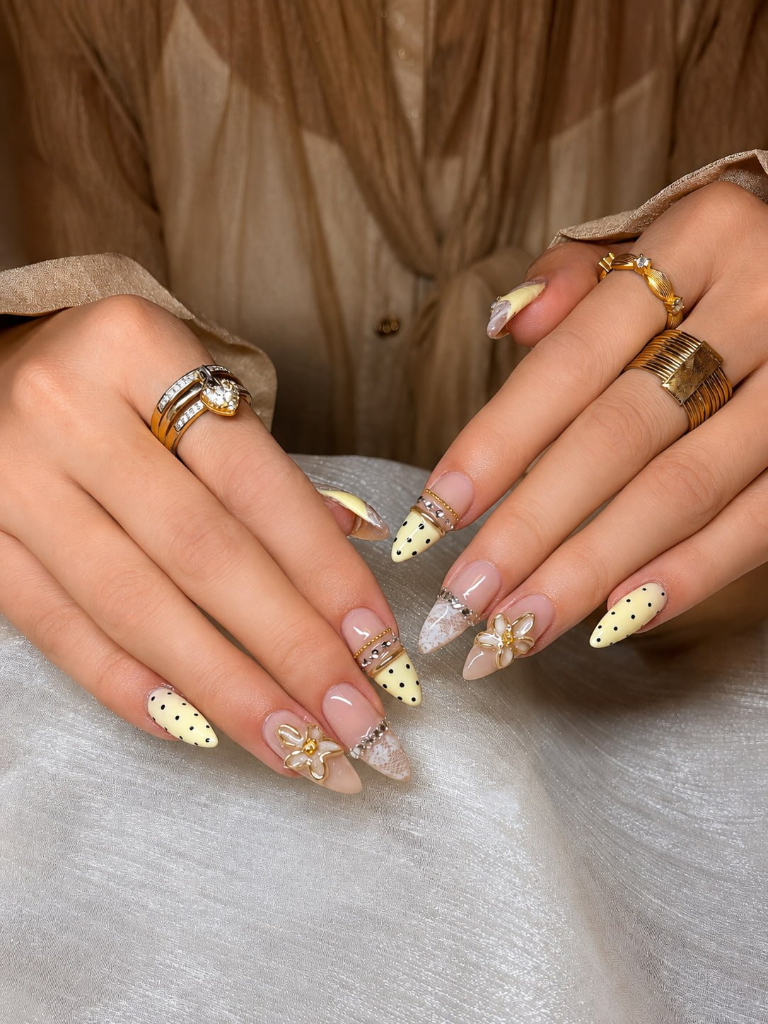 Cream Yellow Floral Fall Nail Design with Elegant Lace Details