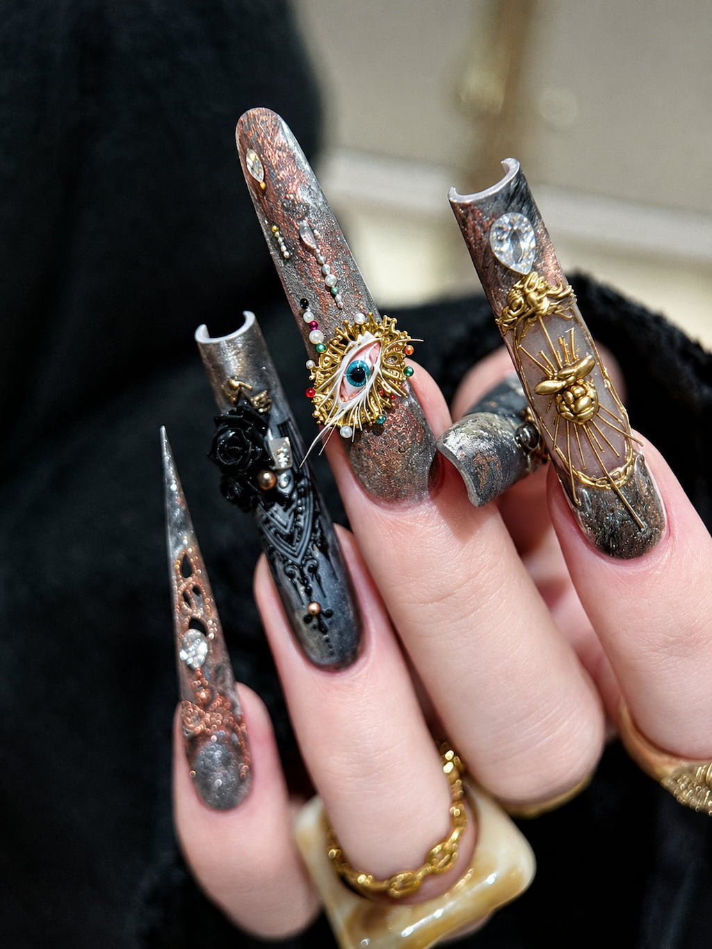 Dark Chrome Y2K Nails with Gold Eye and Beetle Charms