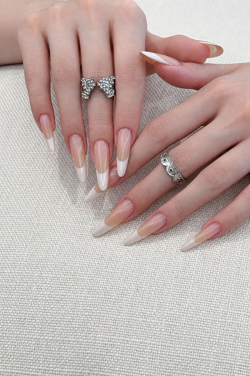 Long Almond French Nails with Sheer Nude and White Tips