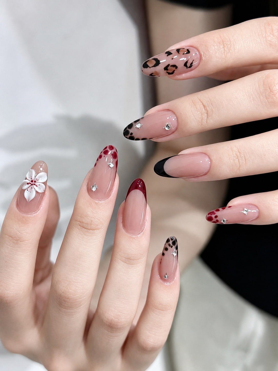 Mixed French Nails with Leopard Print, Red Tips, and a 3D Flower
