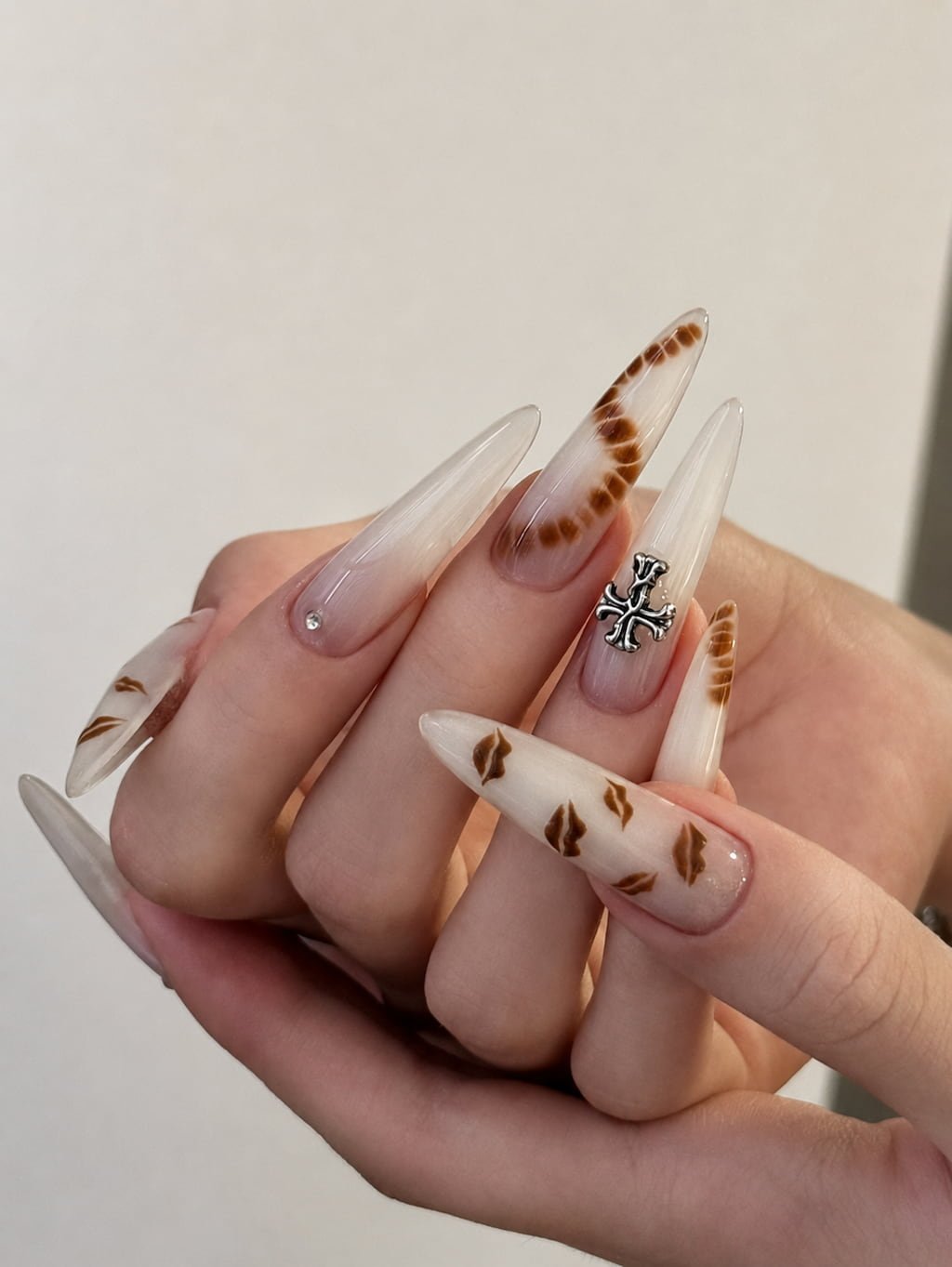 Mocha Kiss Print and Silver Cross August Nails