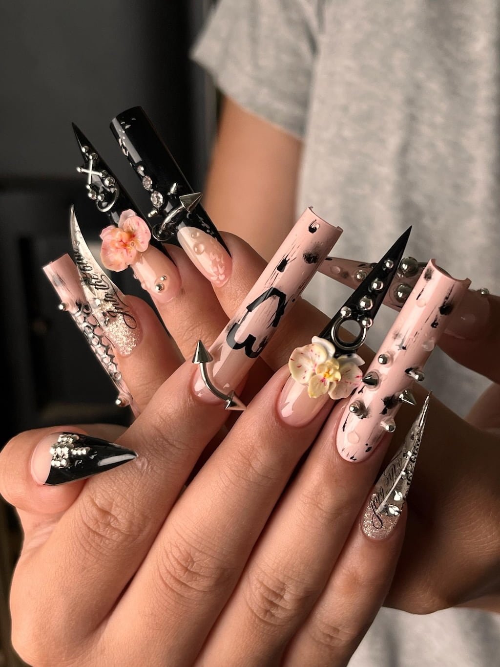 Pink and Black Cat Claw Nails with 3D Flowers and Silver Studs