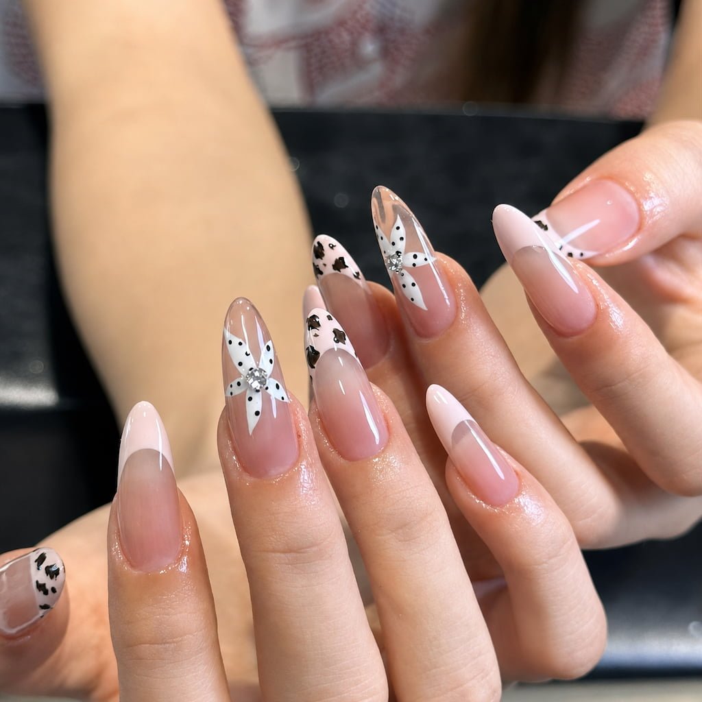 Pink French Tip Preppy Nails with Polka Dot Bow Details