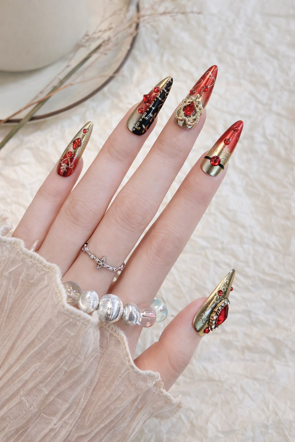 Red, Black and Gold Wedding Nails with Jeweled Accents