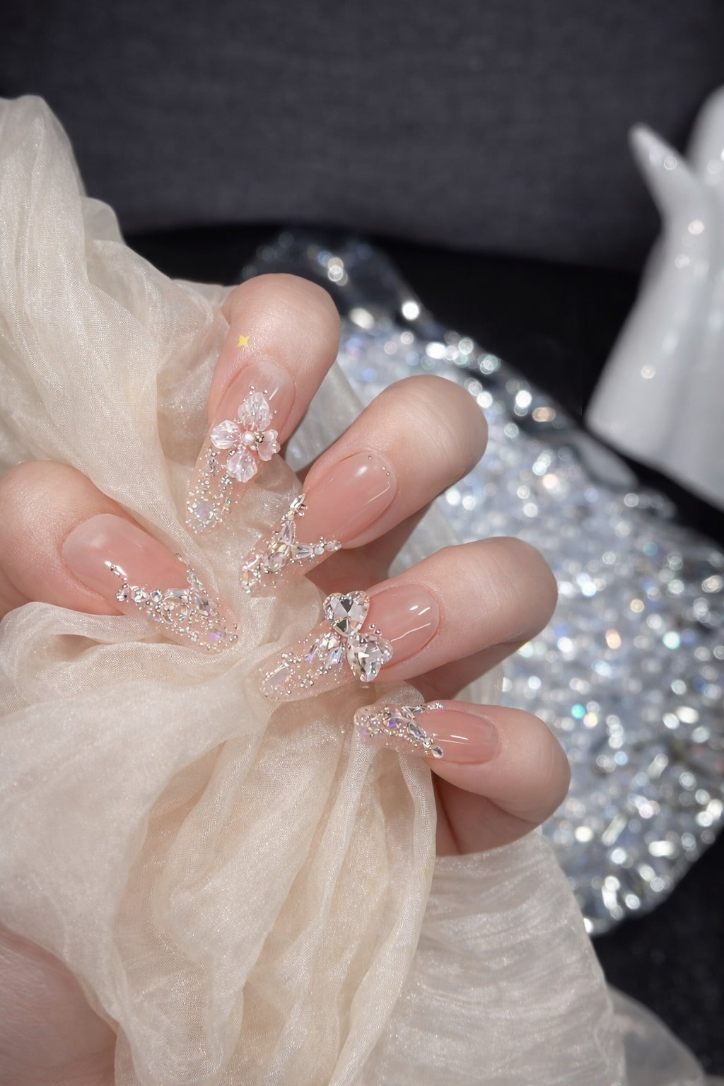 Sheer Nude Wedding Nails with Crystals and Floral Accents