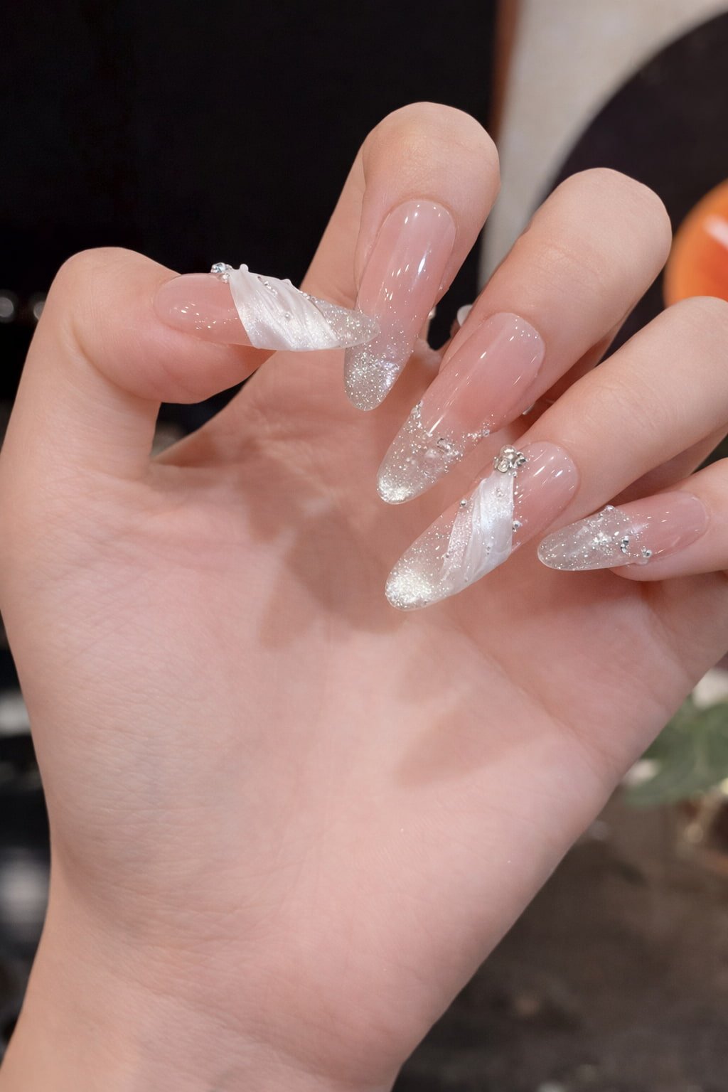 Sheer Pink Wedding Nails with White Swirls and Glitter Tips
