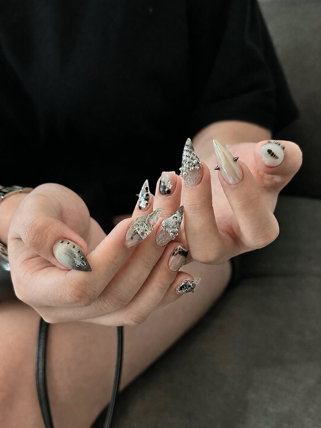 Silver Chrome Cat Claw Nails with Studs and Newspaper Art