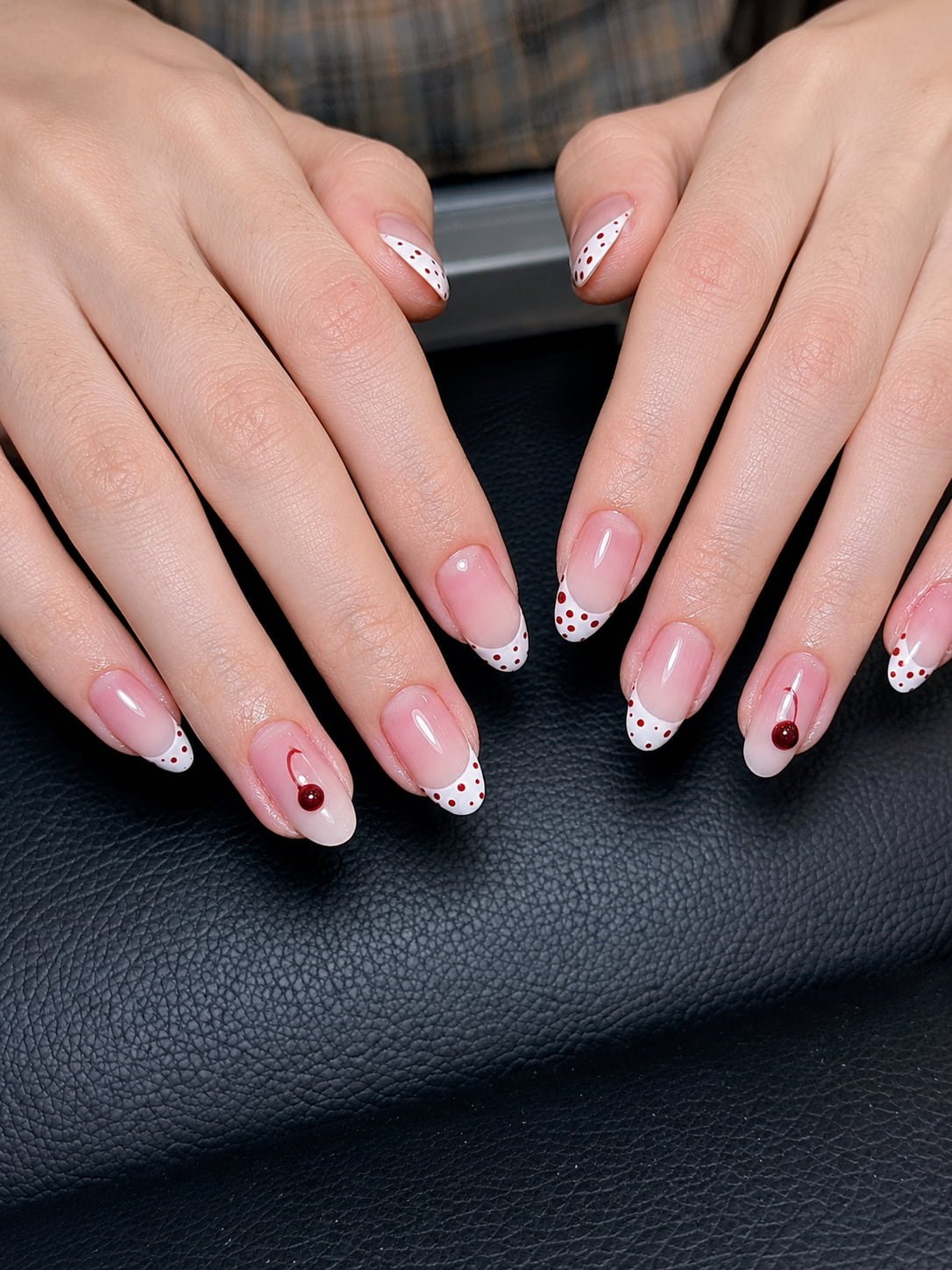 White French Nails with Red Polka Dots and Cherry Accent Art