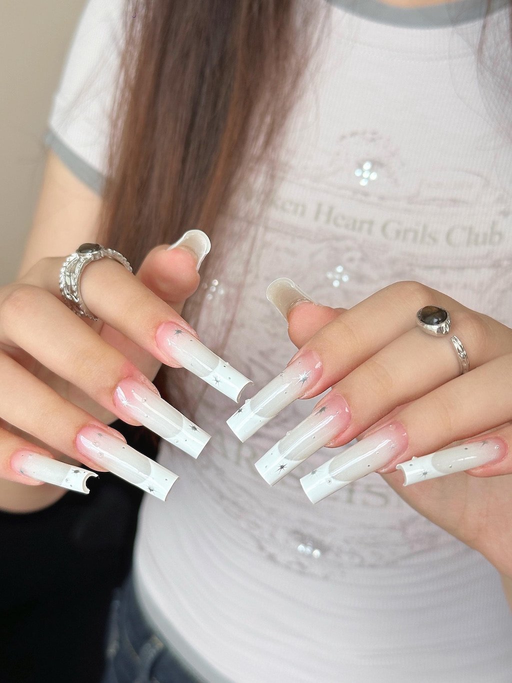 White French Nails with Silver Starburst Details