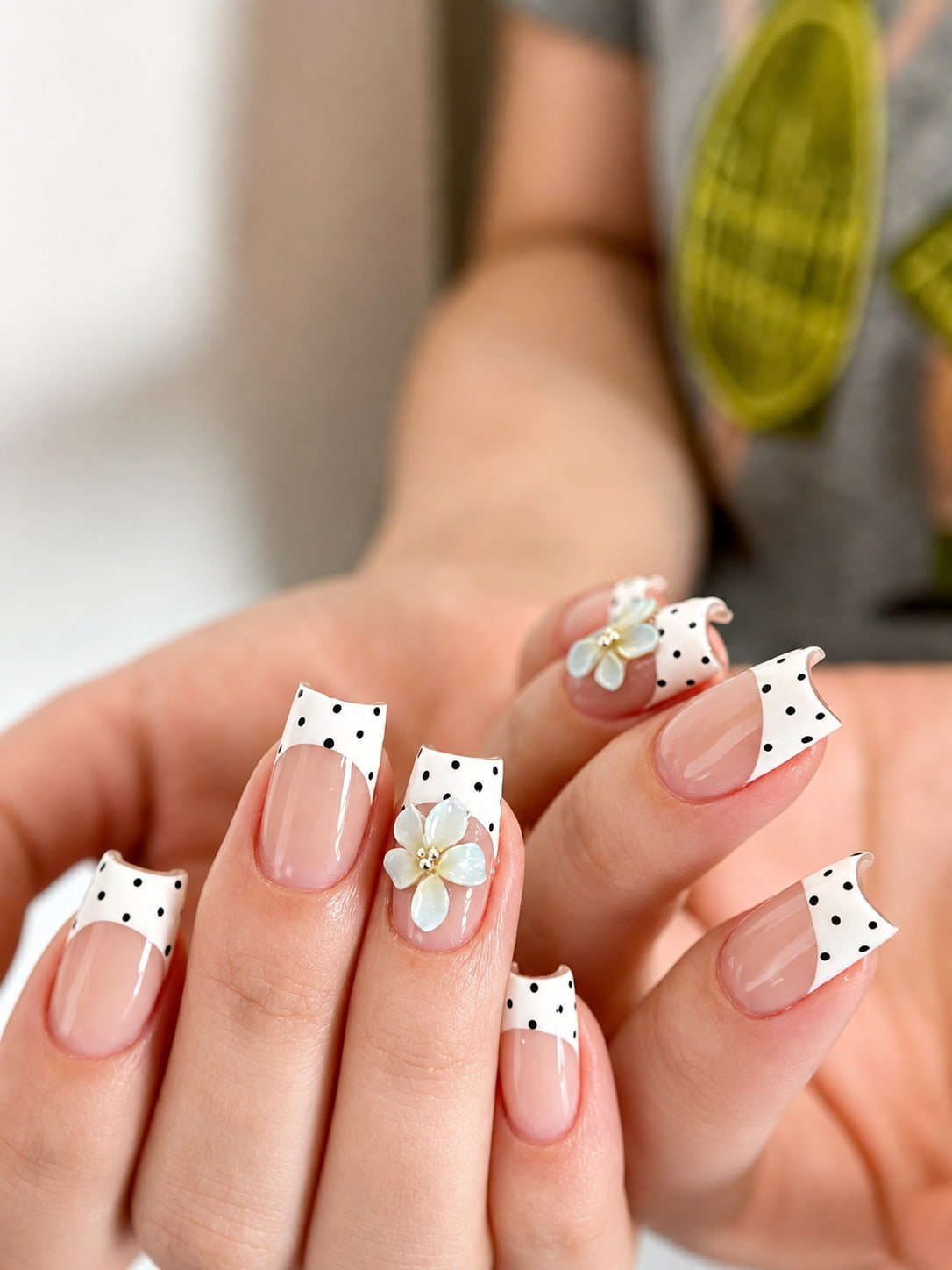 White Polka Dot French Nails with 3D Floral Accents