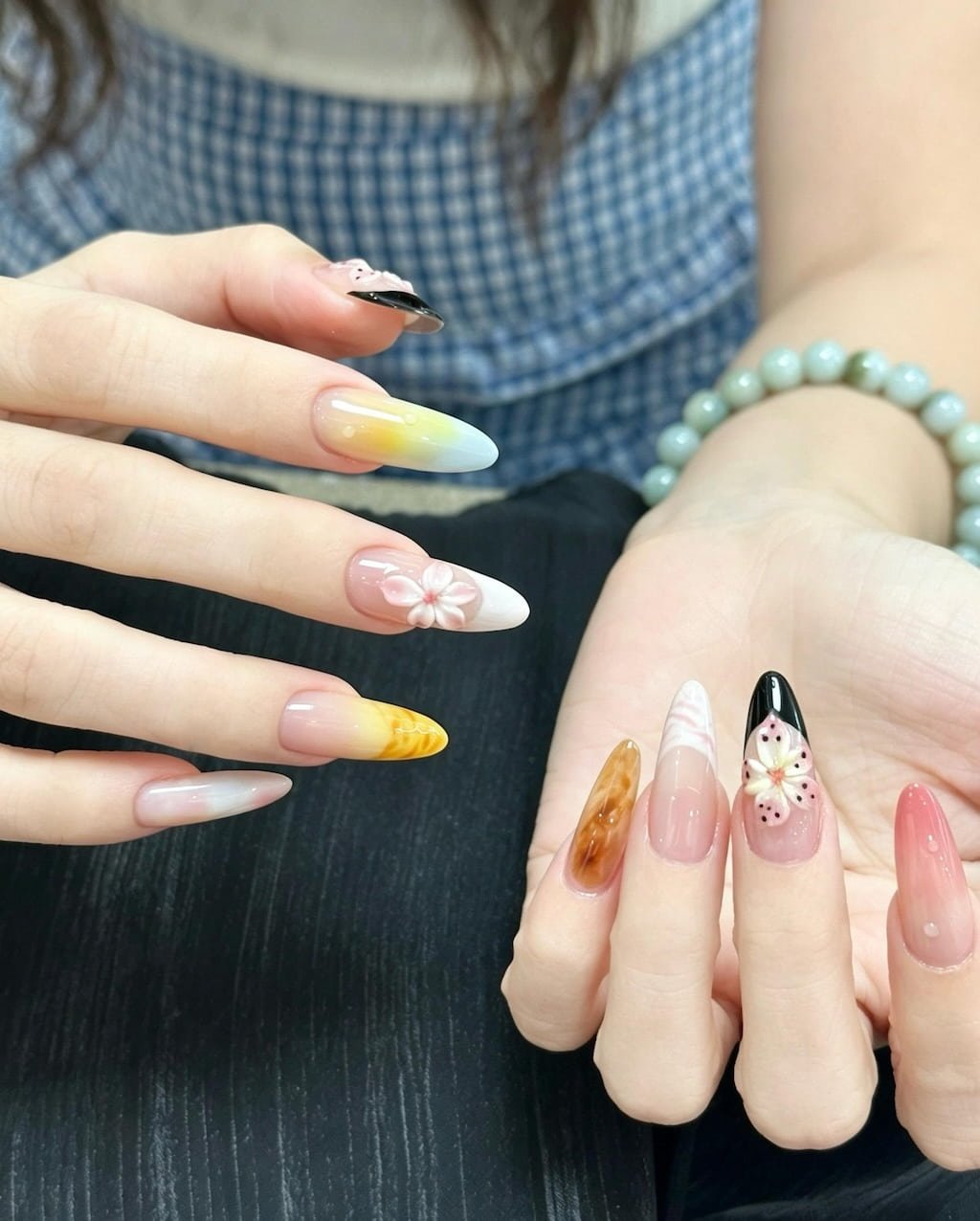Yellow Flower Summer Nail Design with Blue Swirl Tips